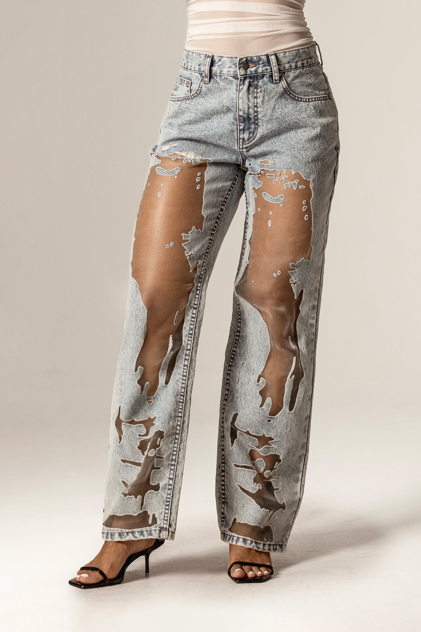 Jean Tula à jambes larges avec empiècements transparents (délavage antique)